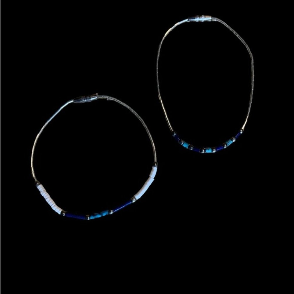 Set of 2 Navajo made sterling and stone bracelets.